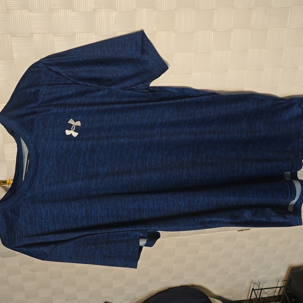 Under armor heated gear shirts blue one is xl black one is large price is for bo